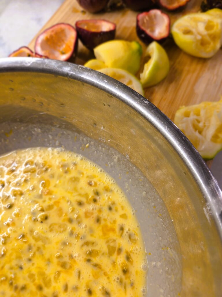 Passionfruit Lemon Tart custard mix with all filling in mixing bowl