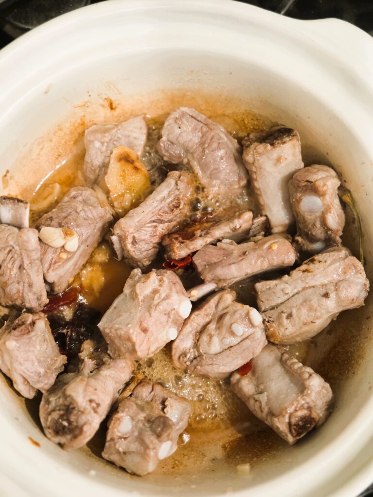 Sauteeing the pork spareribs first